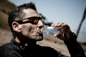Jeff taking a quick water break during a 5 day race through the Himalayas!